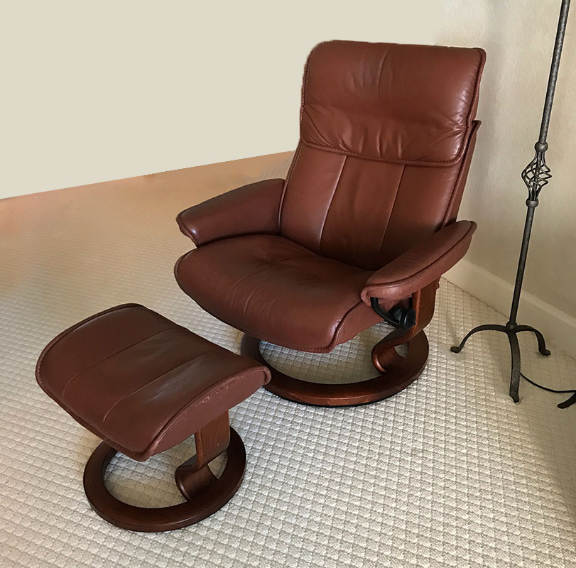 Appraisal: EKORNES STRESSLESS RECLINING LEATHER CHAIR OTTOMAN Brown leather recliner with