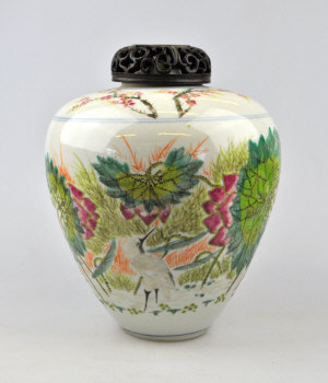 Appraisal: A Chinese famille rose ovoid pot decorated with a stork