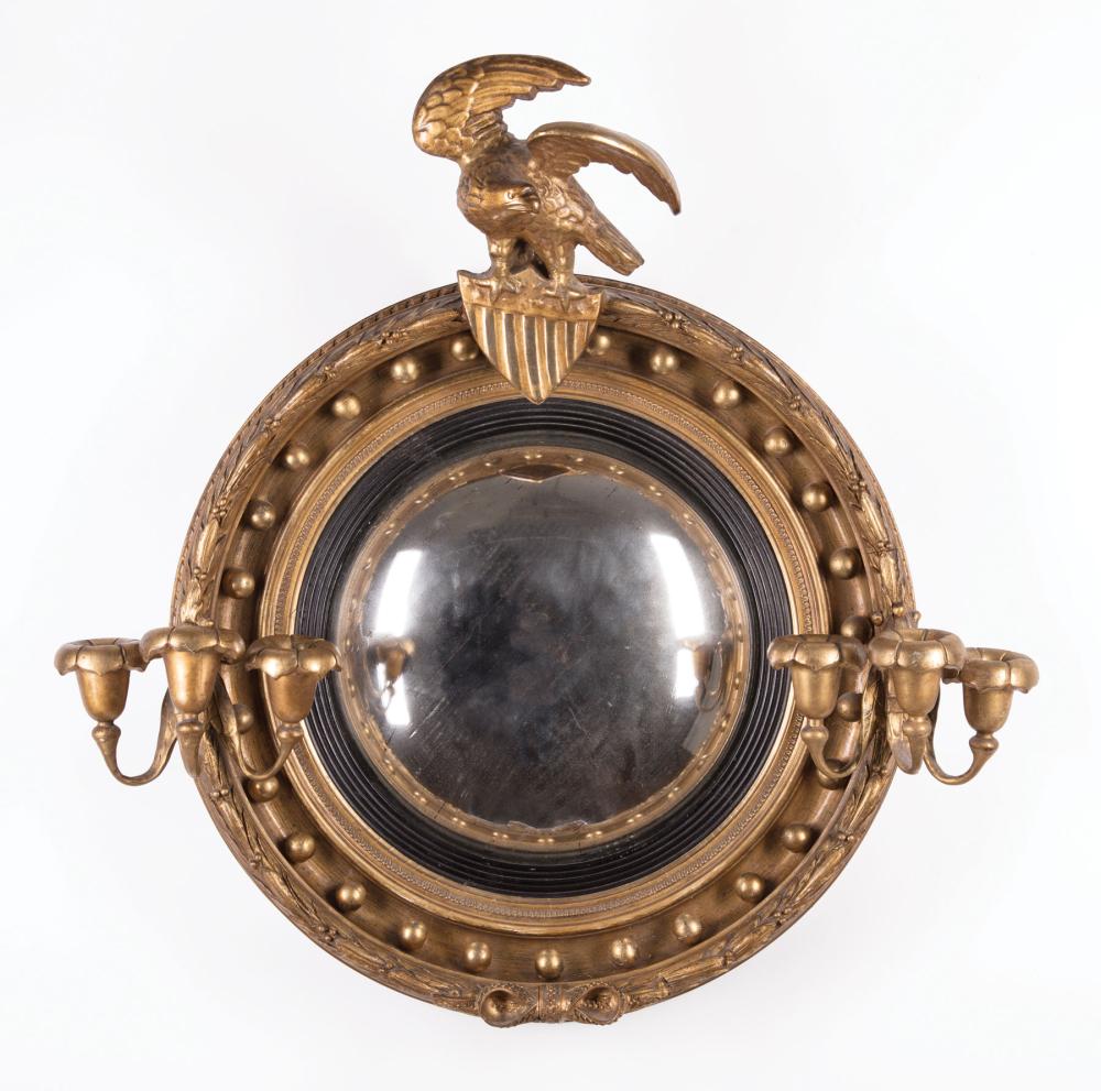 Appraisal: English Carved and Gilded Convex Mirror th c later eagle