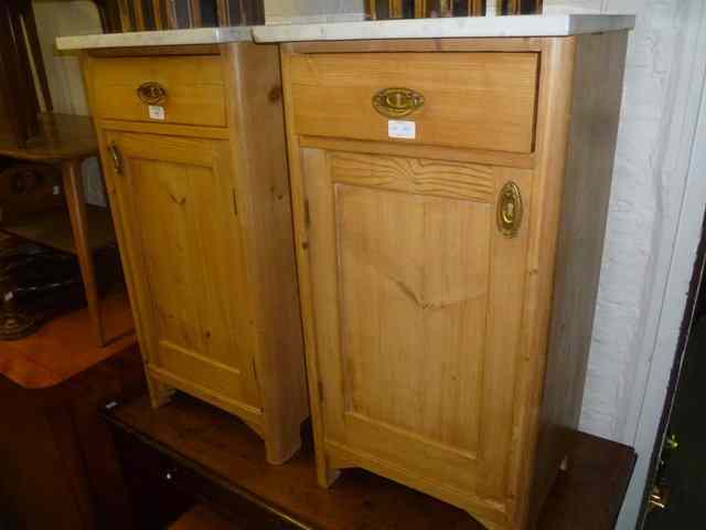 Appraisal: A PAIR OF STRIPPED AND WAXED VICTORIAN PINE BEDSIDE LOCKERS