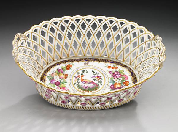 Appraisal: A large Continental porcelain reticulated two handled basket early th