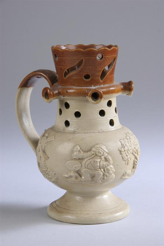 Appraisal: STAFFORDSHIRE STONEWARE PUZZLE JUG Circa Modelled with four spouts between