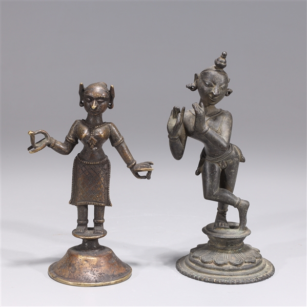 Appraisal: Pair of antique Indian bronze statues including Krishna playing the