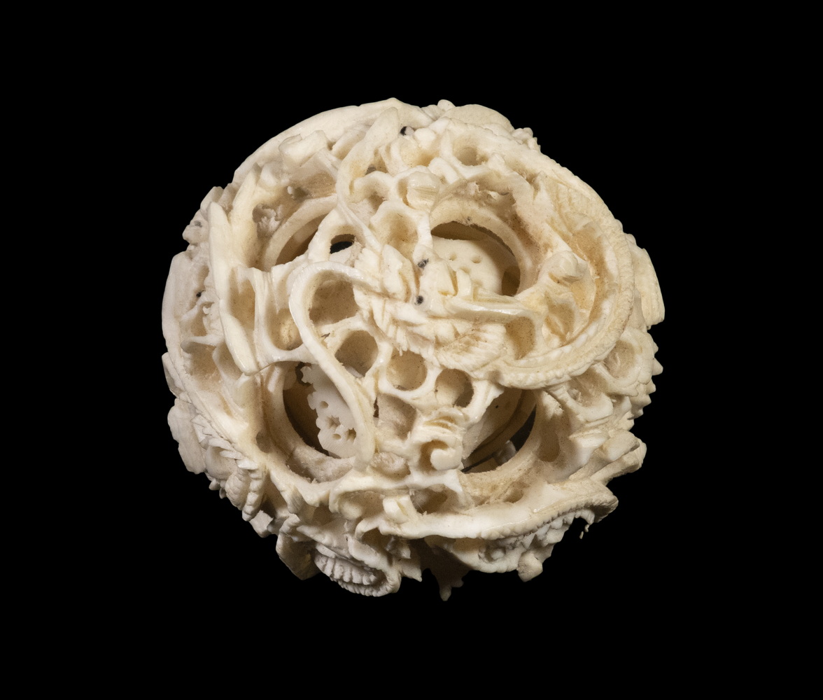 Appraisal: TH C CHINESE CARVED IVORY PUZZLE BALL Appears to be