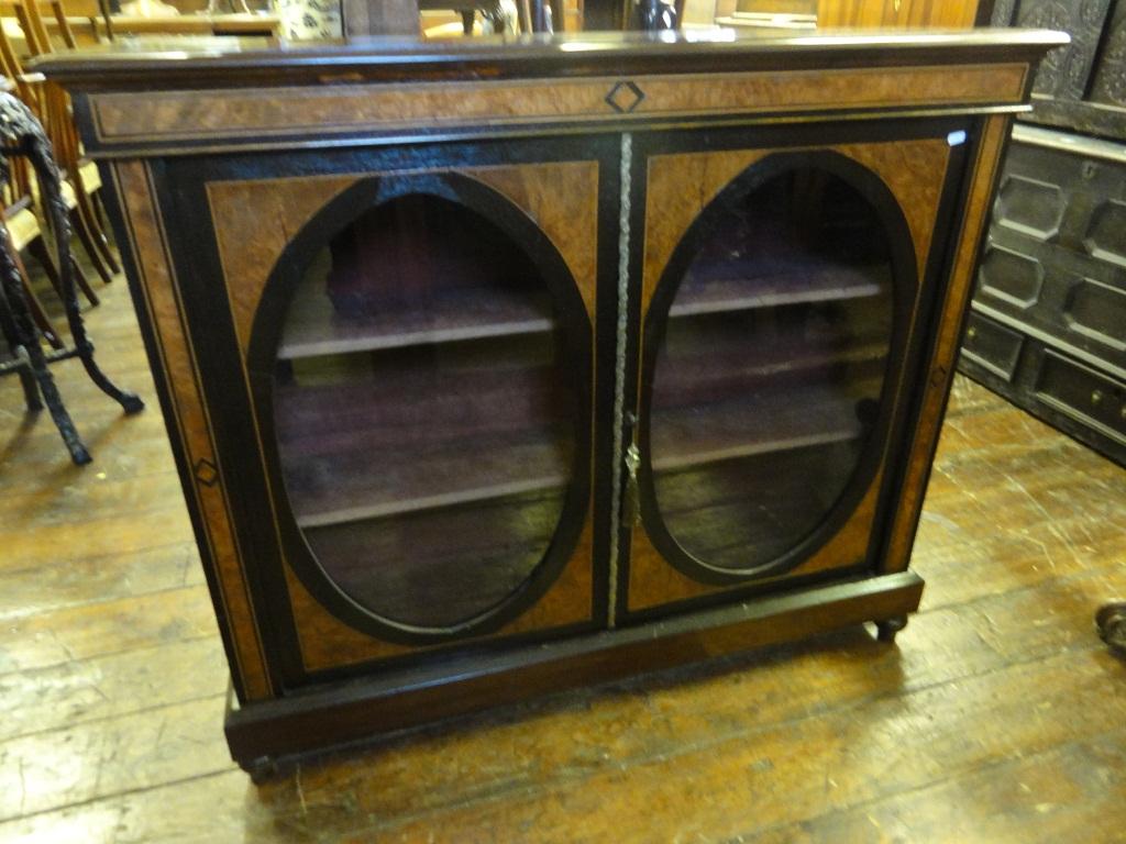 Appraisal: A Victorian pier side cabinet enclosed by a pair of