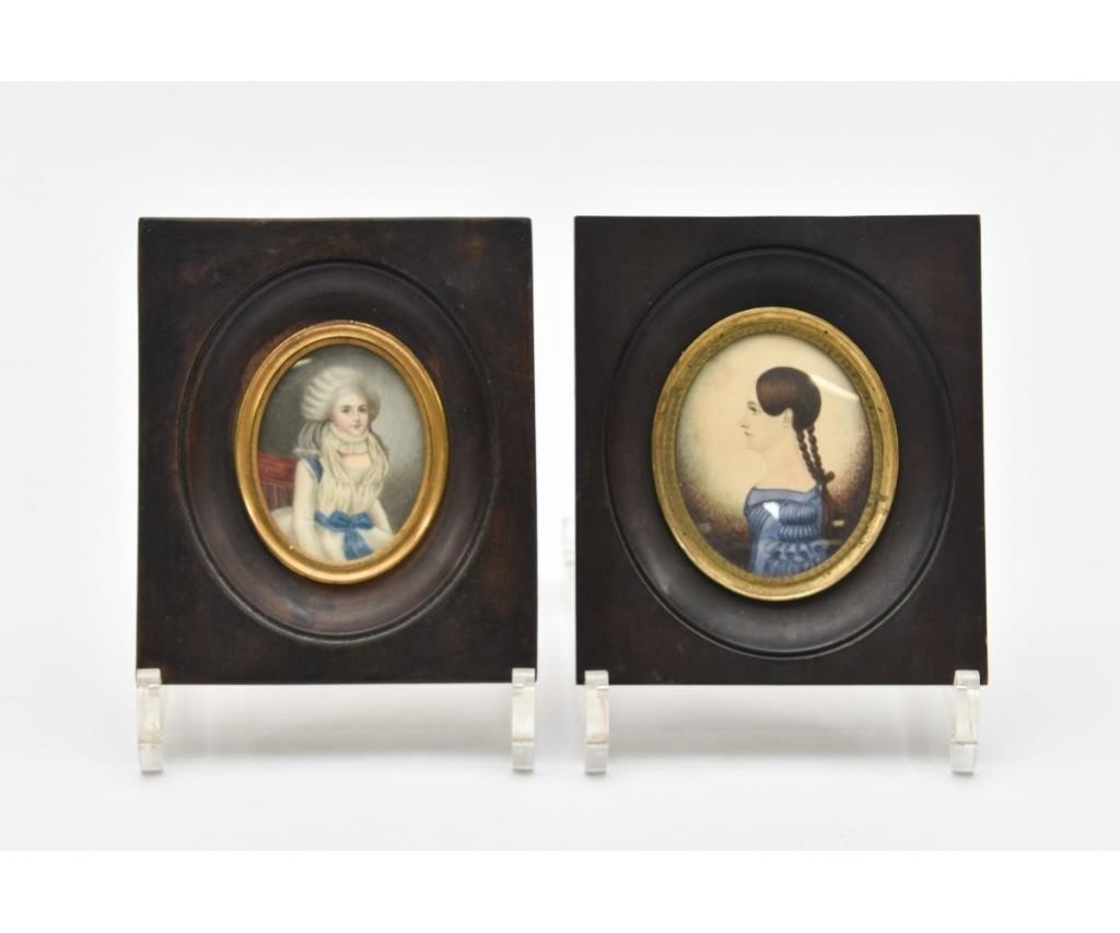 Appraisal: Two miniature hand-painted oval portraits one of a young woman