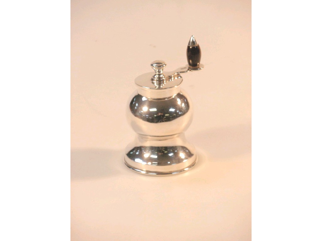 Appraisal: A George V silver capstan pepper mill with wooden handle