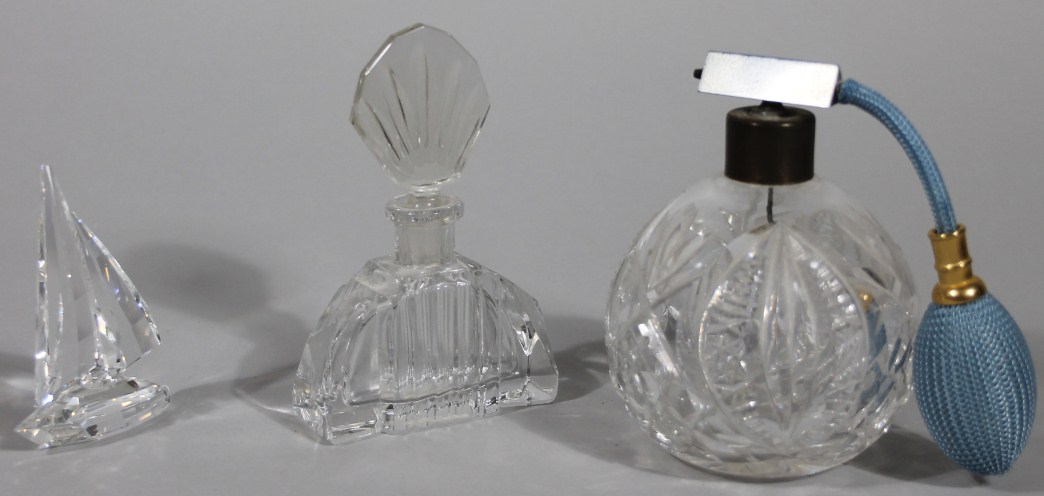 Appraisal: A cut glass perfume atomizer with metal top cm high