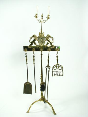 Appraisal: Brass Figural Fireplace Tool Stand depicting lions with a crest