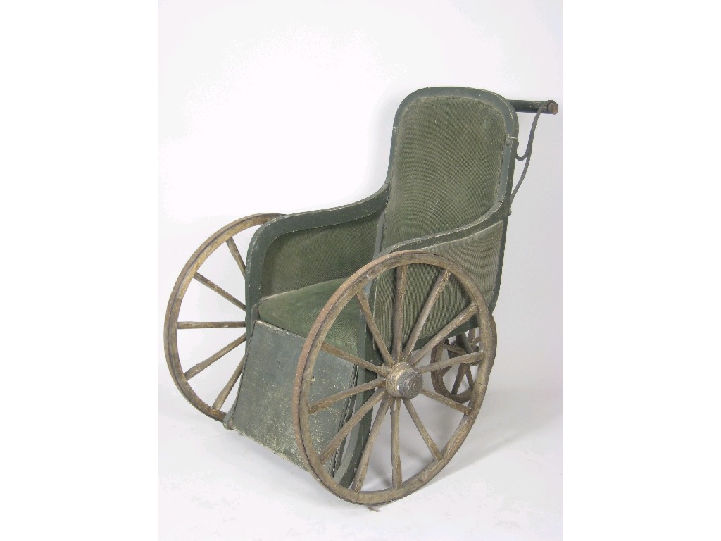 Appraisal: A late th Century Invalid Carriage with wooden spoke wheels