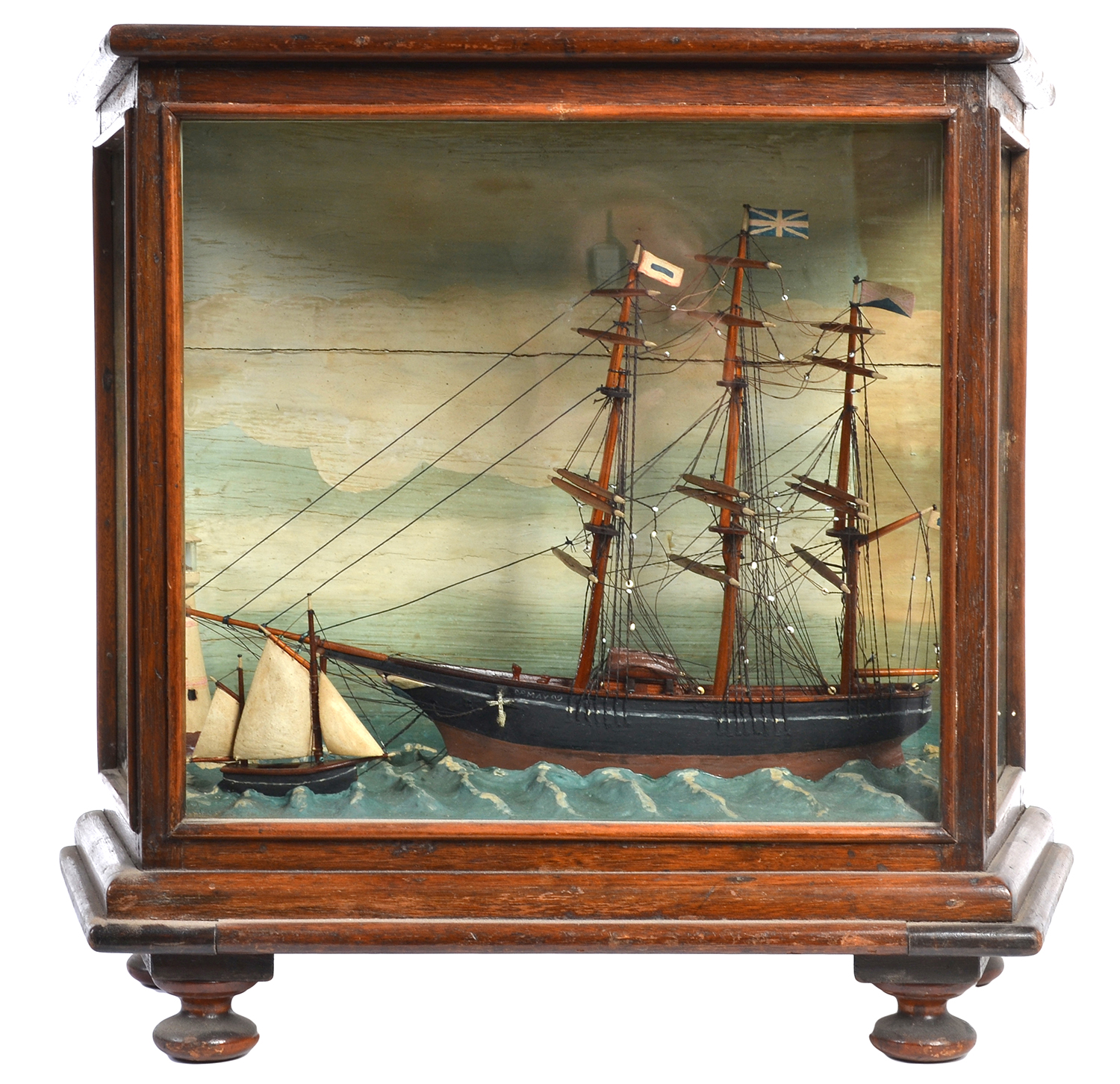 Appraisal: A MODEL SHIP DIORAMA DEPICTING TWO SAILING BOATS AT SEA