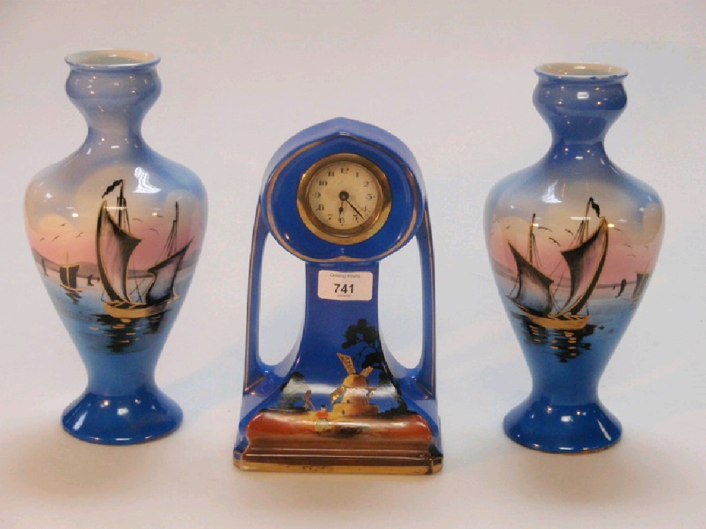 Appraisal: A Falcon ware ceramic clock and two vases