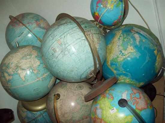 Appraisal: A COLLECTION OF TEN REVOLVING WORLD GLOBES