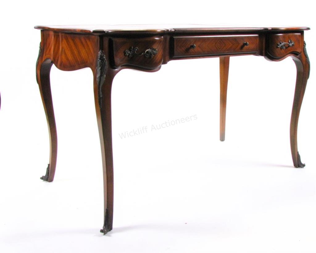 Appraisal: A French period style writing desk by Artistica mounted ormolu