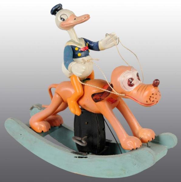 Appraisal: Celluloid Donald Duck Riding Pluto Rocking Toy Description Japanese Pre-war