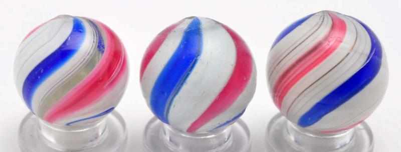 Appraisal: Lot of Peppermint Swirl Marbles Description Single red banded peppermints