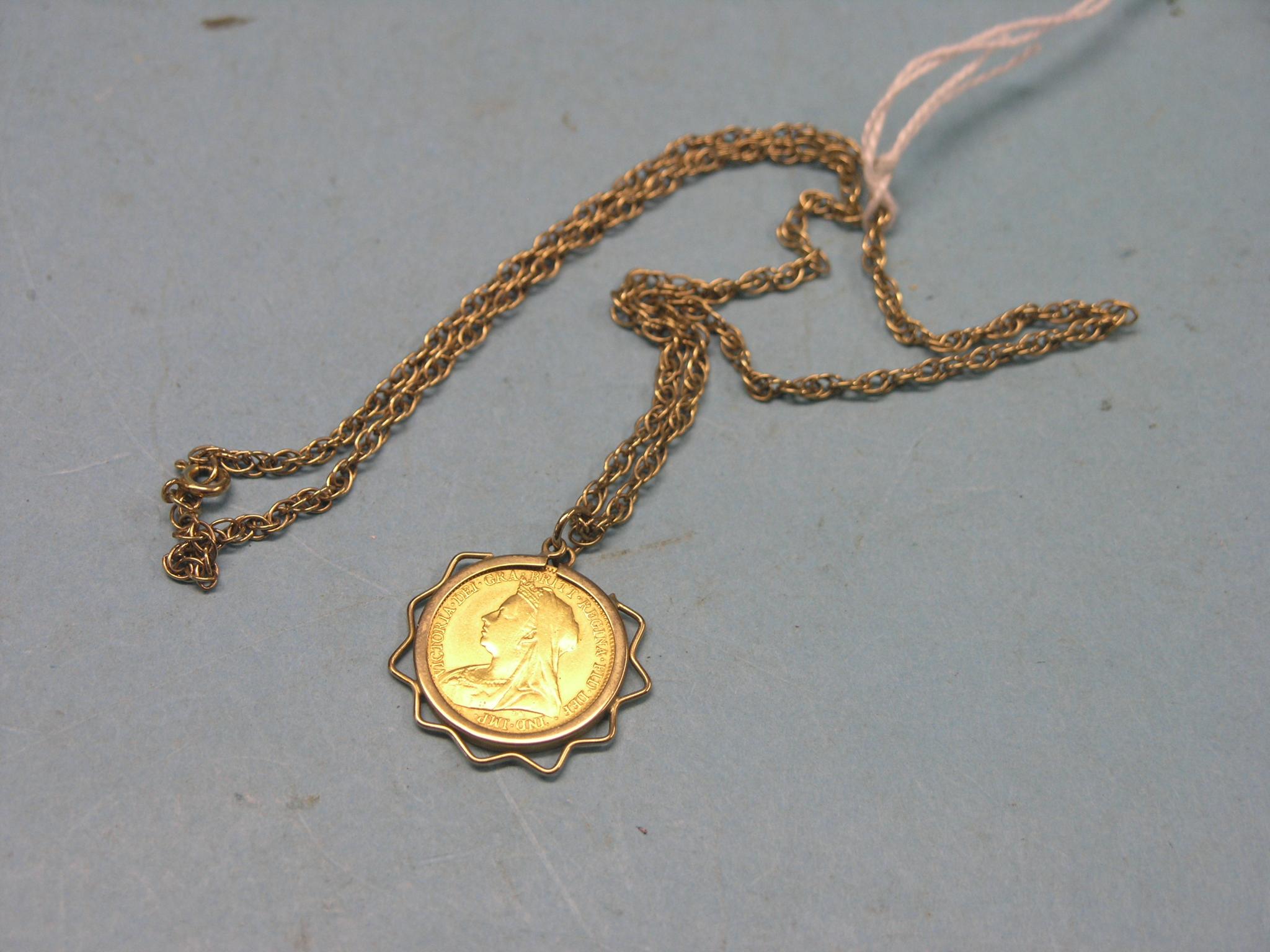 Appraisal: A Victorian gold half-sovereign within yellow metal mount on ct