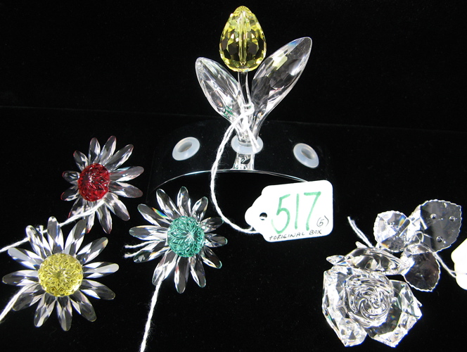 Appraisal: FIVE SWAROVSKI AUSTRIAN CUT CRYSTAL FLOWERS The Rose with faceted