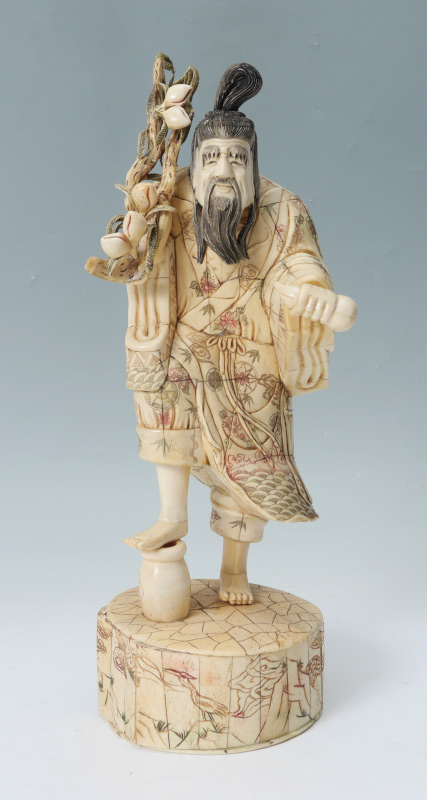 Appraisal: BONE CLAD ORIENTAL FRUIT SELLER Bone clad figure of a