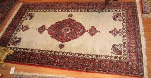 Appraisal: BACHTIAR old White ground with a red central medallion red