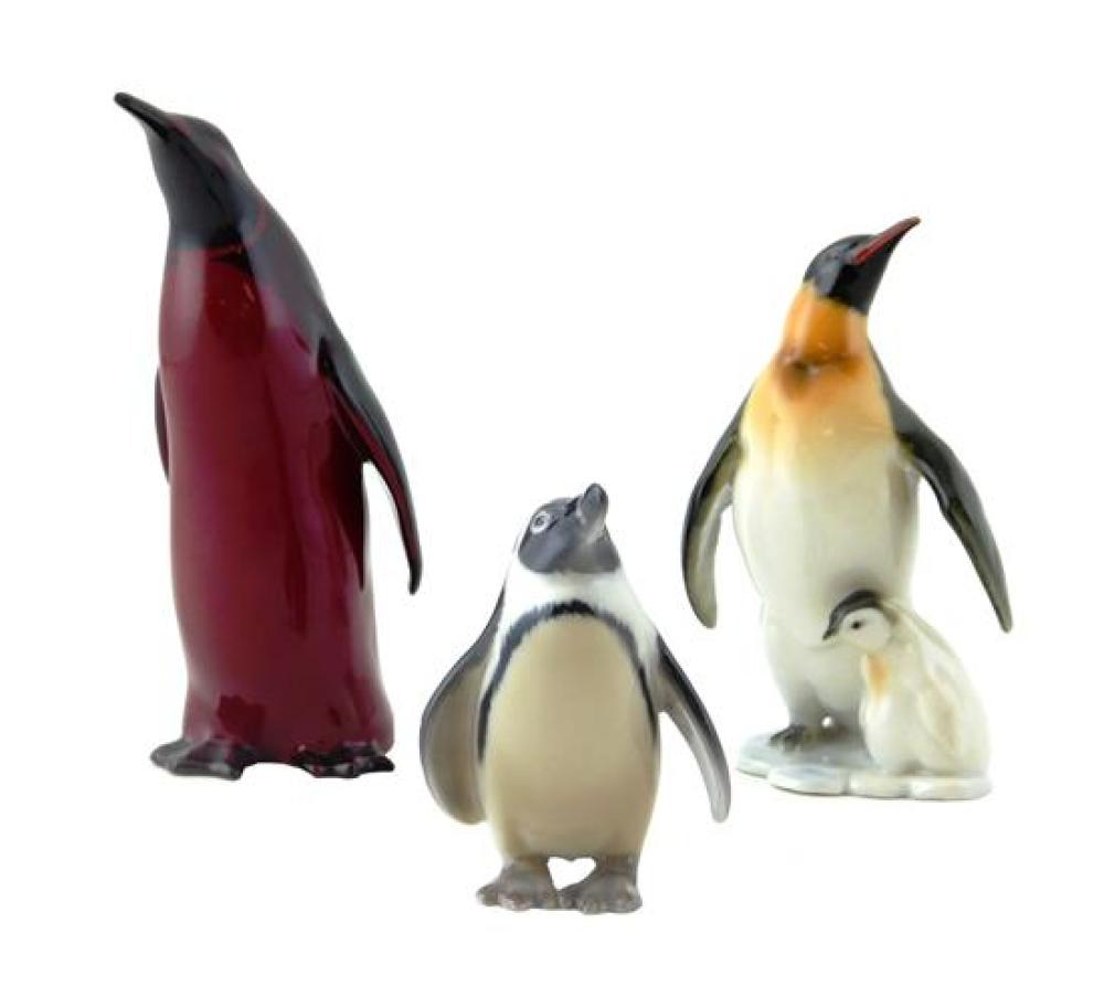 Appraisal: Three ceramic penguin figurines including one Royal Doulton flambe glaze