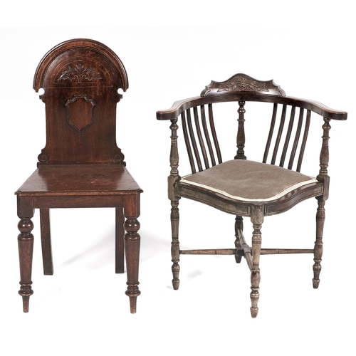 Appraisal: A Victorian oak hall chair with arched back seat height