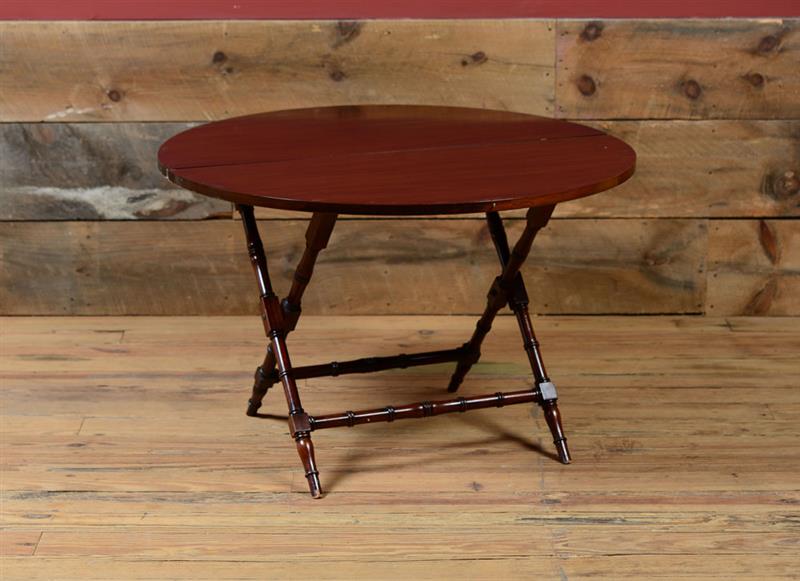 Appraisal: ENGLISH MAHOGANY FOLDING CRICKET TABLE x x in Property from