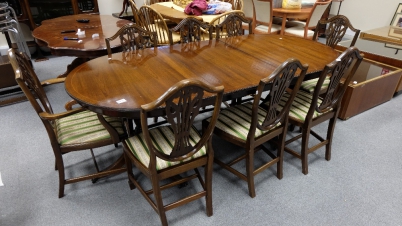 Appraisal: Reproduction Hepplewhite style extending inlaid Mahogany dinning table and a