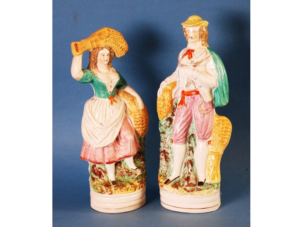 Appraisal: PAIR VICTORIAN STAFFORDSHIRE POTTERY FIGURES MALE AND FEMALE HARVESTERS STANDING