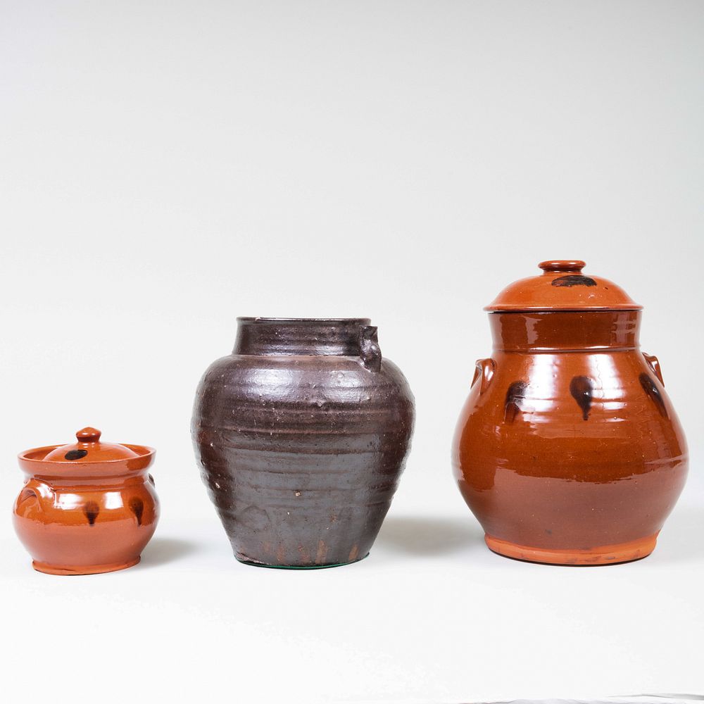 Appraisal: Two American Redware Cannister and Covers and an Earthenware Vessel