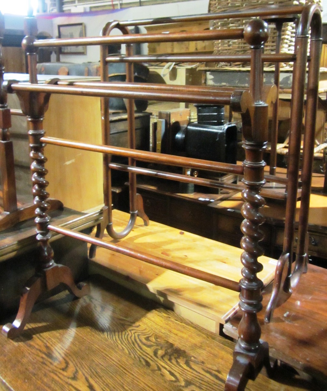 Appraisal: A th century mahogany towel rail and two others