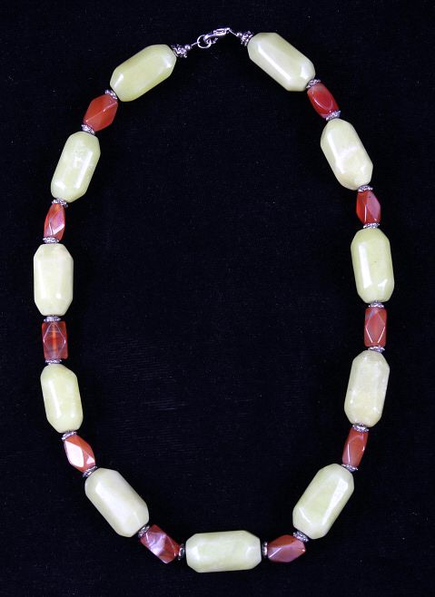 Appraisal: Jade Orange Agate Polished Stone Nugget Necklace Included in this