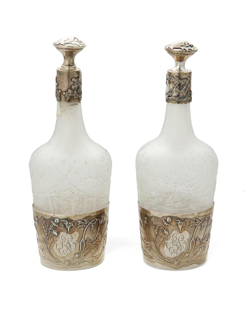 Appraisal: A PAIR OF DAUM GLASS AND STERLING SILVER PERFUME BOTTLESA