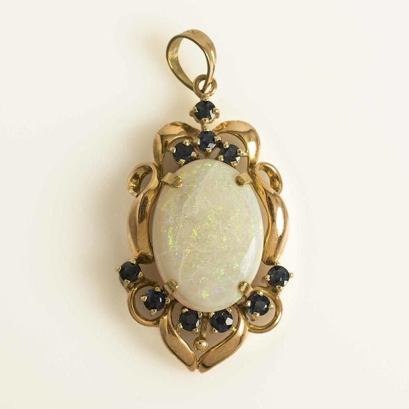 Appraisal: Opal and Sapphire k Pendant Opal and sapphire k pendant