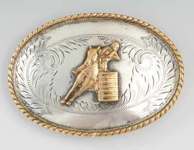 Appraisal: A Sterling Silver and Gold Belt Buckle The oval shape