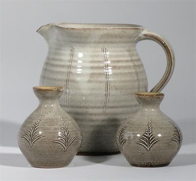 Appraisal: A near pair of Lowerdown Pottery tin-glazed earthenware vases by