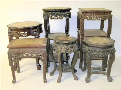 Appraisal: Five Chinese hardwood occasional tablesEach with inset marble tops above