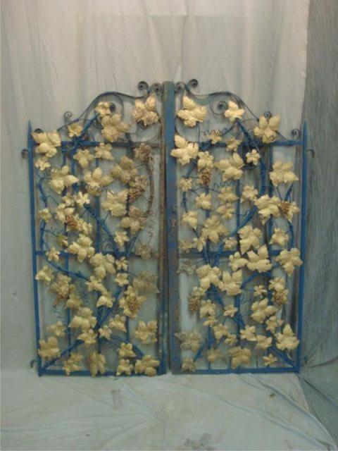 Appraisal: Pair of Metal Gates with Floral Decoration From a Westchester