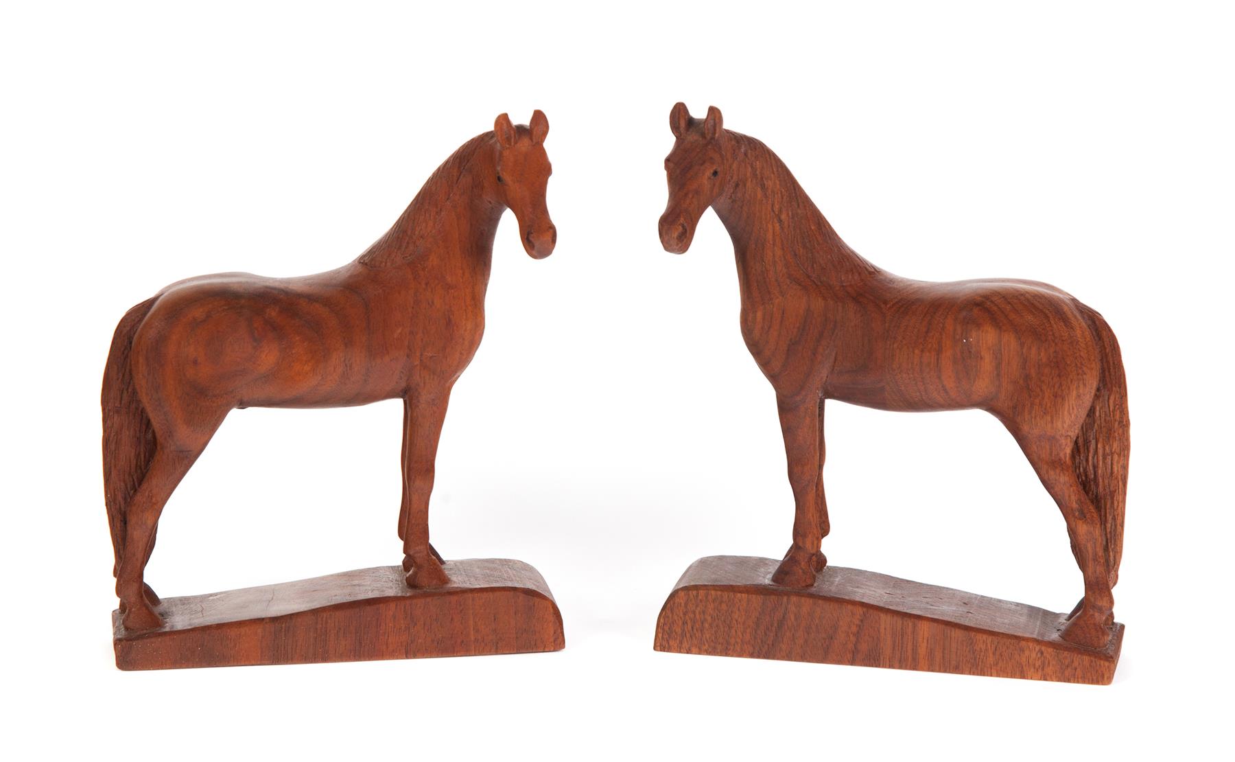 Appraisal: TWO HAND-CARVED HORSES American walnut Carved by William G Taylor