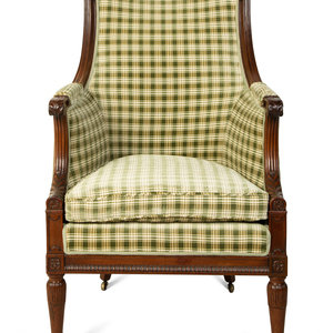 Appraisal: A Regency Style Carved Mahogany High Back Upholstered Armchair TH