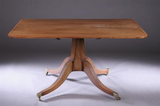 Appraisal: ENGLISH REGENCY WALNUT SINGLE-PEDESTAL DINING TABLE th century Rounded-corner rectangular