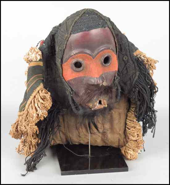 Appraisal: CARVED AND PAINTED WOOD MASK With attached fabric hood and