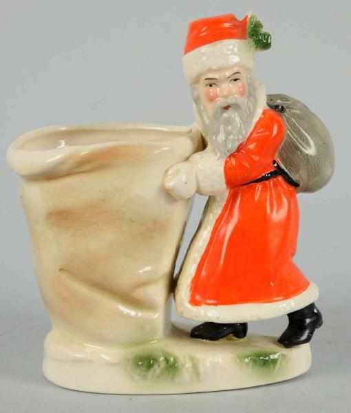 Appraisal: Santa Holding Toy Sack Chinese One base crack Condition Very