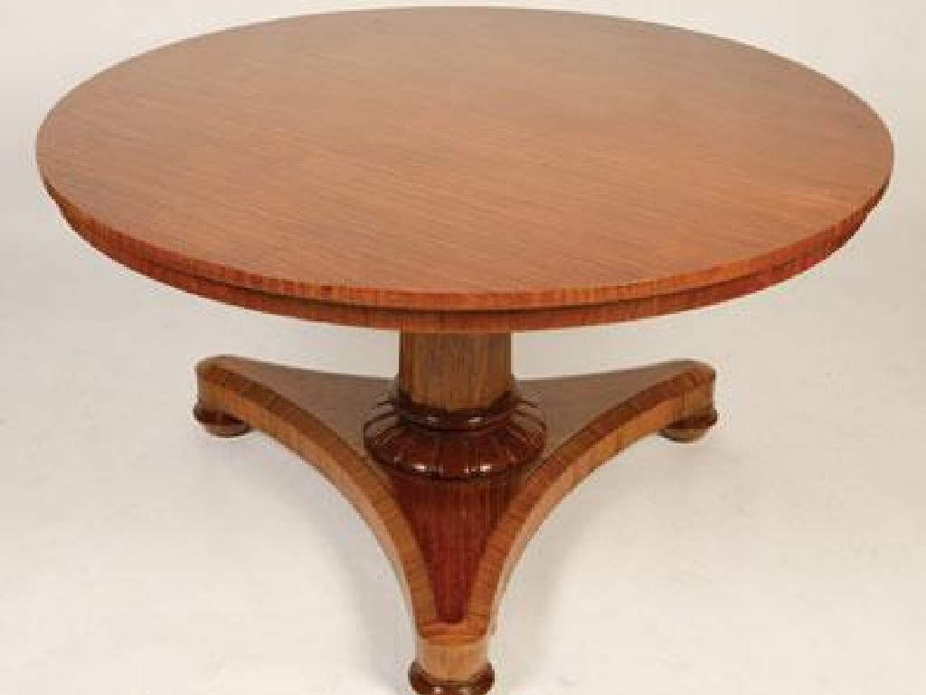 Appraisal: A LATE REGENCY SATINWOOD CENTRE TABLE with circular top on