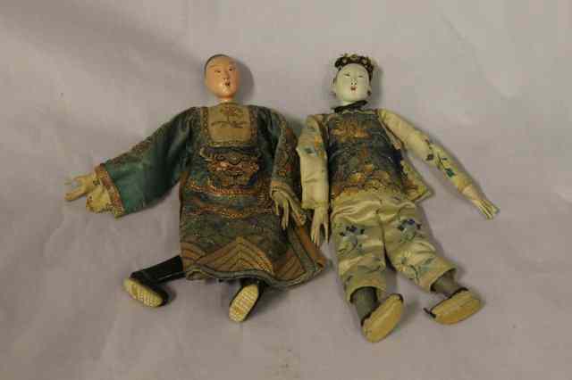 Appraisal: TWO CHINESE DOLLS a Mandarin and his wife each in