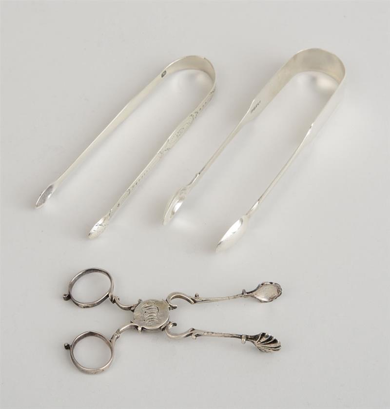 Appraisal: TWO PAIRS OF GEORGE III SILVER SUGAR TONGS AND A