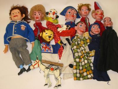 Appraisal: Ten painted composition Punch glove puppets a plastic and felt