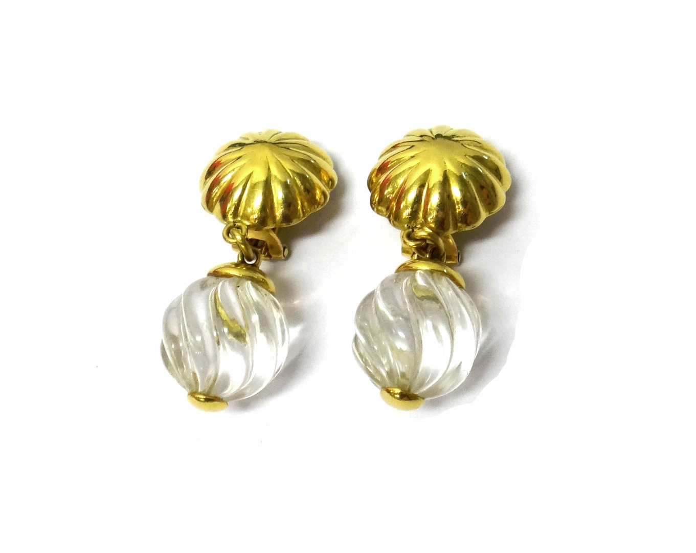 Appraisal: A pair of gold and rock crystal pendant earrings each