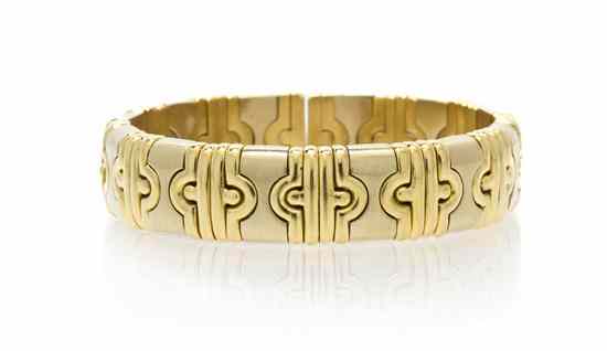 Appraisal: An Karat Gold Flexible Bangle Bracelet in an alternating yellow