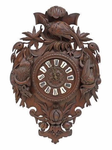 Appraisal: Black Forest wall clock th c carved oak case with